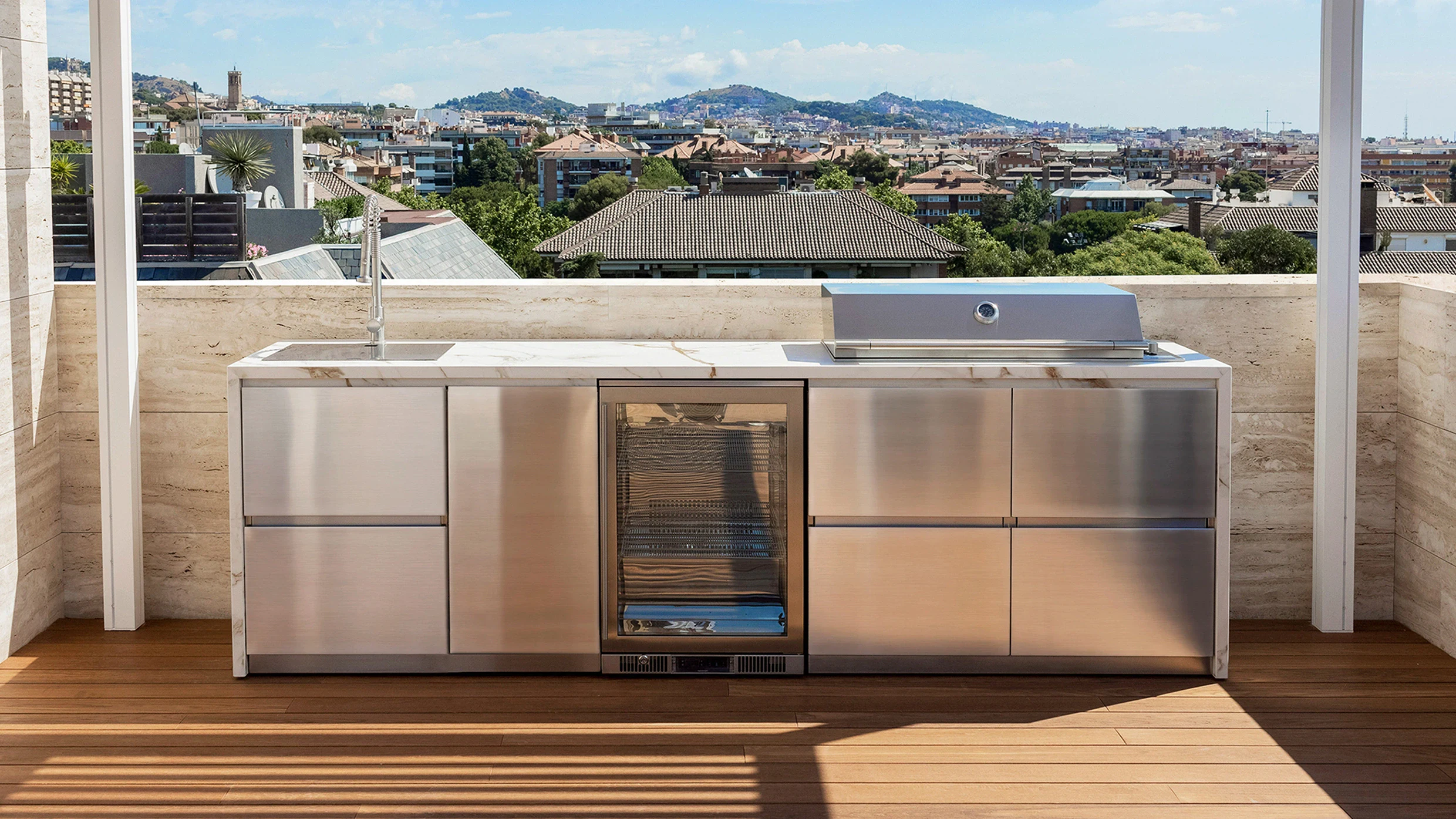 outdoor kitchen with refrigerator